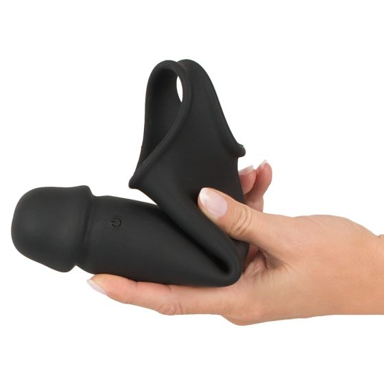 Rebel - vibrirajoča ovojnica za penis z radijskim nadzorom, ki jo je mogoče ponovno napolniti (črna)