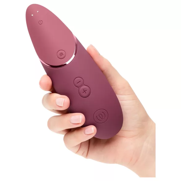 Womanizer Next - vibrator za klitoris z zračnimi valovi - roza - akumulatorski